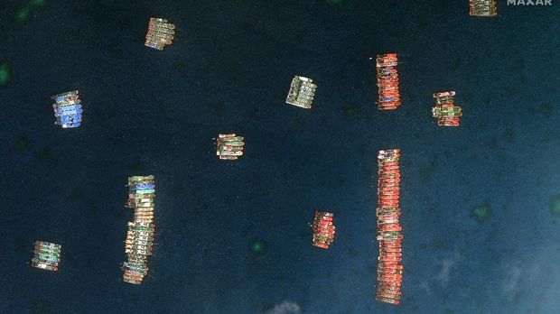 This satellite image provided by Maxar Technologies shows Chinese vessels anchored the Whitsun Reef located in the disputed South China Sea. Tuesday, March 23, 2021. The United States said Tuesday it’s backing the Philippines in a new standoff with Beijing in the disputed South China Sea, where Manila has asked a Chinese fishing flotilla to leave a reef. China ignored the call, insisting it owns the offshore territory. (©2021 Maxar Technologies via AP)