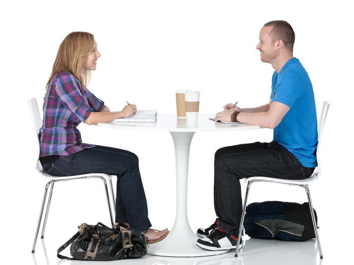 Ilustrasi pasangan mengobrol Full length of a cool young couple writing in notepads over white background