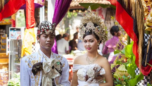 Bali, Indonesia - February 11. Woman enacting wedding scene in preparation for religious ceremony on February 11, 2012 in Bali, Indonesia. Most Balinese get married in their early 20s.