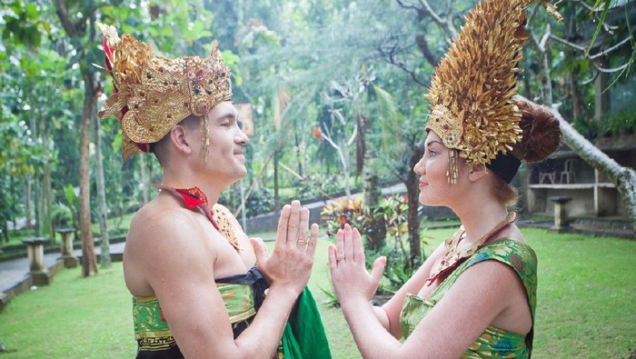 Bali, Indonesia - February 11. Woman enacting wedding scene in preparation for religious ceremony on February 11, 2012 in Bali, Indonesia. Most Balinese get married in their early 20s.