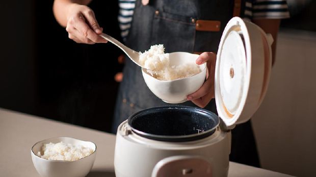 Ilustrasi memasak nasi di rice cooker
