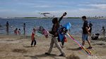Libur Panjang, Pantai Ancol Diserbu Wisatawan