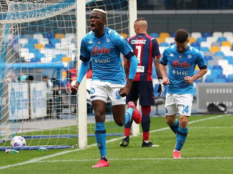 NAPLES, ITALY - APRIL 03: Victor Osimhen of SSC Napoli celebrates after scoring their side's second goal during the Serie A match between SSC Napoli and FC Crotone at Stadio Diego Armando Maradona on April 03, 2021 in Naples, Italy. Sporting stadiums around Italy remain under strict restrictions due to the Coronavirus Pandemic as Government social distancing laws prohibit fans inside venues resulting in games being played behind closed doors. (Photo by Francesco Pecoraro/Getty Images)