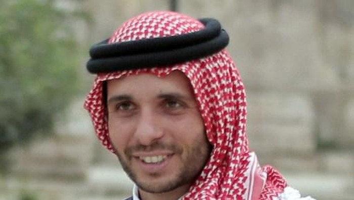 (FILES) In this file photo taken on September 09, 2015 shows Jordans Prince Hamzah Bin Al-Hussein attends a press event in Amman where Prince Ali announced his bid to succeed FIFA president Joseph Blatter. - A top former Jordanian royal aide was among several suspects arrested on April 3, 2021, as the army cautioned Prince Hamzah bin Hussein, the half-brother of King Abdullah II against damaging the countrys security. Hamzah is the eldest son of late King Hussein and his American wife Queen Noor. He has good relations officially with Abdullah and is a popular figure close to tribal leaders. (Photo by KHALIL MAZRAAWI / AFP)