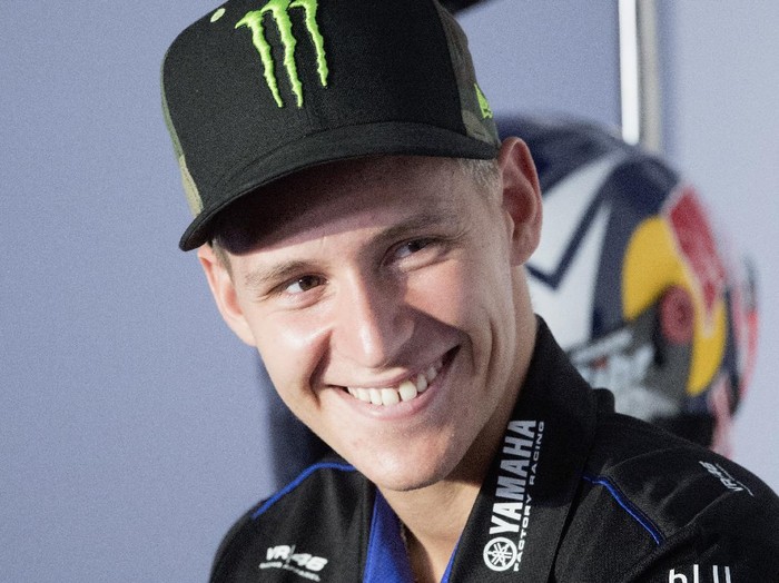 DOHA, QATAR - APRIL 01:  Fabio Quartararo of France and Monster Energy Yamaha MotoGP Team smiles during the press conference pre-event during the MotoGP of Qatar - Previews at Losail Circuit on April 01, 2021 in Doha, Qatar. (Photo by Mirco Lazzari gp/Getty Images)