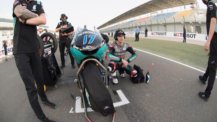 DOHA, QATAR - APRIL 04:  John McPhee of Great Britain and Petronas Sprinta Racing prepares to start on the grid during the Moto3 race during the MotoGP of Qatar - Race at Losail Circuit on April 04, 2021 in Doha, Qatar. (Photo by Mirco Lazzari gp/Getty Images)