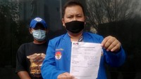 Waketum DPP KNPI, Lisman Hasibuan, menjawab pertanyaan wartawan usai melaporkan pimpinan KPK ke Dewas KPK terkait SP3 kasus BLBI di Gedung KPK, Jakarta.