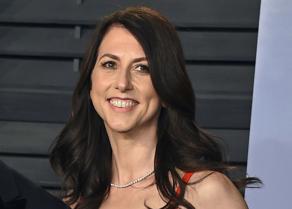 FILE - In this March 4, 2018, file photo, then-MacKenzie Bezos arrives at the Vanity Fair Oscar Party in Beverly Hills, Calif. Scott, philanthropist, author and former wife of Amazon founder Jeff Bezos, has married a Seattle science teacher. Dan Jewett wrote in a letter to the website of the nonprofit organization the Giving Pledge, on Saturday, March 6, 2021, that he was grateful to be able to marry such a generous person and was ready to help her give away her wealth to help others. (Photo by Evan Agostini/Invision/AP, File)