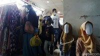 Pengunjung tampak berlalu lalang dari satu kios ke kios lainnya.