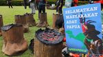 Bawa Bonggol Pohon, Aktivis Lingkungan Tolak Pengrusakan Hutan