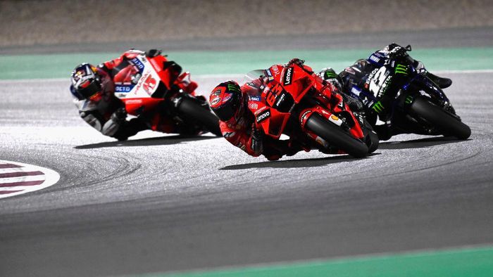 Ducati MotoGP DOHA, QATAR - MARCH 28: Francesco Bagnaia of Italy and Ducati Lenovo Team leads Maverick Vinales of Spain and Monster Energy Yamaha MotoGP Team and Johann Zarco of France and Pramac Racing during the MotoGP race during the MotoGP of Qatar - Race at Losail Circuit on March 28, 2021 in Doha, Qatar. (Photo by Mirco Lazzari gp/Getty Images)