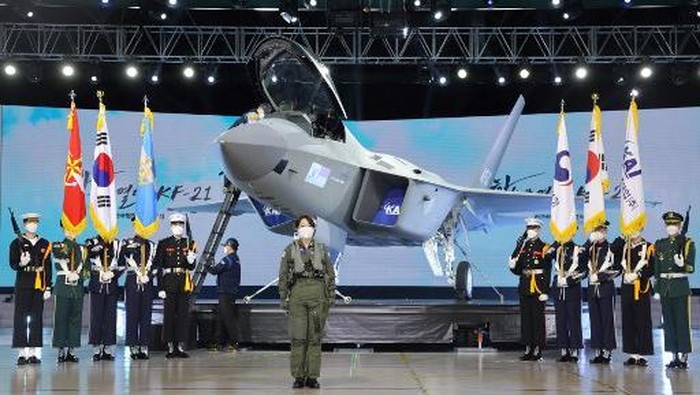 A prototype of the KF-21 Boramae fighter, South Korea's next-generation indigenous fighter jet, is displayed during its unveiling event at the Korea Aerospace Industries headquarters in the southern city of Sacheon on April 9, 2021. (Photo by - / YONHAP / AFP) / - South Korea OUT / REPUBLIC OF KOREA OUT  NO ARCHIVES  RESTRICTED TO SUBSCRIPTION USE