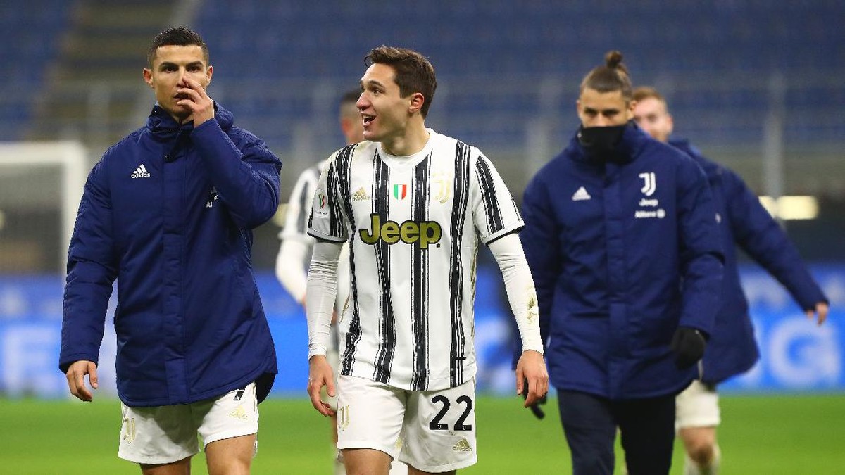 Cristiano Ronaldo dan Federico Chiesa semasa main bareng di Juventus. (Foto: Getty Images/Marco Luzzani)