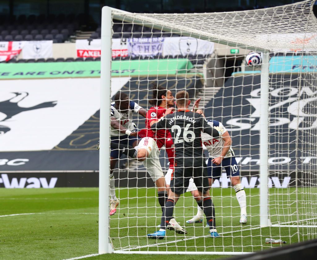 LONDON, ENGLAND - APRIL 11: Edinson Cavani of Manchester United scores their side's second goal during the Premier League match between Tottenham Hotspur and Manchester United at Tottenham Hotspur Stadium on April 11, 2021 in London, England. Sporting stadiums around the UK remain under strict restrictions due to the Coronavirus Pandemic as Government social distancing laws prohibit fans inside venues resulting in games being played behind closed doors. (Photo by Adrian Dennis - Pool/Getty Images)