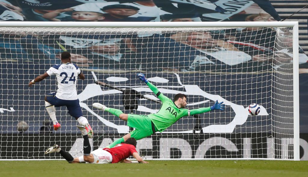 LONDON, ENGLAND - APRIL 11: Edinson Cavani of Manchester United scores their side's second goal past Hugo Lloris of Tottenham Hotspur during the Premier League match between Tottenham Hotspur and Manchester United at Tottenham Hotspur Stadium on April 11, 2021 in London, England. Sporting stadiums around the UK remain under strict restrictions due to the Coronavirus Pandemic as Government social distancing laws prohibit fans inside venues resulting in games being played behind closed doors. (Photo by Matthew Childs - Pool/Getty Images)
