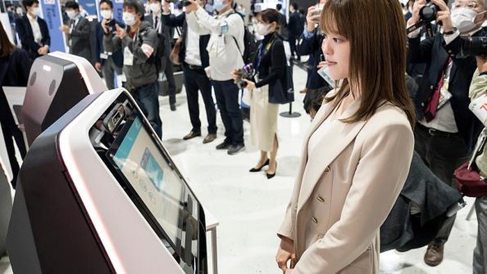 Bandara Internasional Narita mulai uji coba teknologi pengenalan wajah. Mesin itu diharapkan dapat percepat proses boarding dan cegah penyebaran virus Corona.