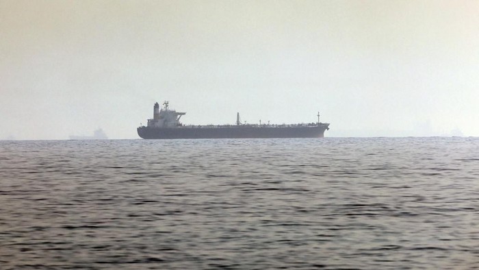 A ship is pictured off the coast of Fujairah in the United Arab Emirates on April 14, 2021. - An Israeli-operated ship was attacked off the UAE opposite the Iranian coast, Israeli media said, in the latest apparent escalation between the Jewish state and the Islamic republic. Security sources, quoted by Israels Channel 12 television, said the vessel Hyperion Ray was lightly damaged near the Emirati port of Fujairah, with Iran suspected of carrying out the attack. (Photo by Giuseppe CACACE / AFP)