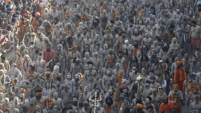 SENSITIVE MATERIAL. THIS IMAGE MAY OFFEND OR DISTURB  Naga Sadhus, or Hindu holy men participate in the procession for taking a dip in the Ganges River during Shahi Snan at 