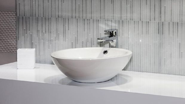 Modern white sink in bathroom interior close up view