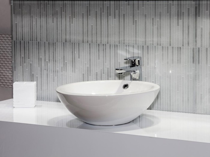 Modern white sink in bathroom interior close up view