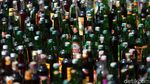 Alat Berat Gilas Barang Bukti Ribuan Botol Miras