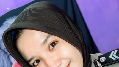 Ini 10 Potret Wanita Bertato & Tindik yang Viral Kini Jadi Polwan Berhijab