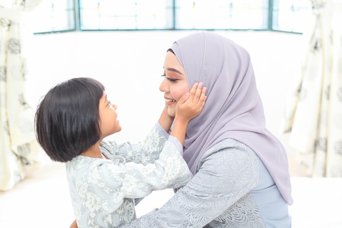 Mother and daughter on Hari Raya Aidilfitri/ Eid-Ul-Fitr in Malaysia.