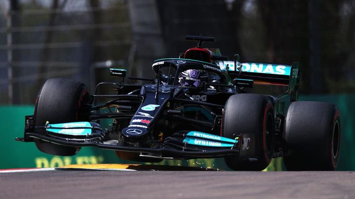 Lewis Hamilton IMOLA, ITALY - APRIL 17: Lewis Hamilton of Great Britain driving the (44) Mercedes AMG Petronas F1 Team Mercedes W12 launches off a raised kerb during qualifying ahead of the F1 Grand Prix of Emilia Romagna at Autodromo Enzo e Dino Ferrari on April 17, 2021 in Imola, Italy. (Photo by Lars Baron/Getty Images)