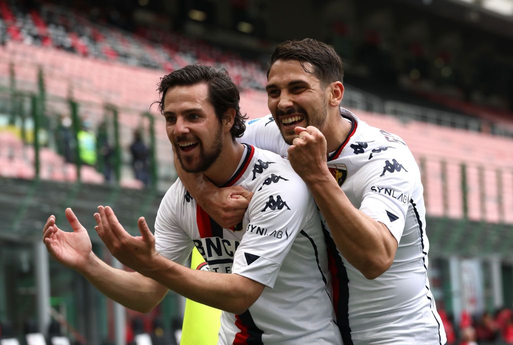 MILAN, ITALY - APRIL 18: Ante Rebic of A.C. Milan  celebrates with teammates after scoring their team's first goal  during the Serie A match between AC Milan  and Genoa CFC at Stadio Giuseppe Meazza on April 18, 2021 in Milan, Italy. Sporting stadiums around Italy remain under strict restrictions due to the Coronavirus Pandemic as Government social distancing laws prohibit fans inside venues resulting in games being played behind closed doors. (Photo by Marco Luzzani/Getty Images)
