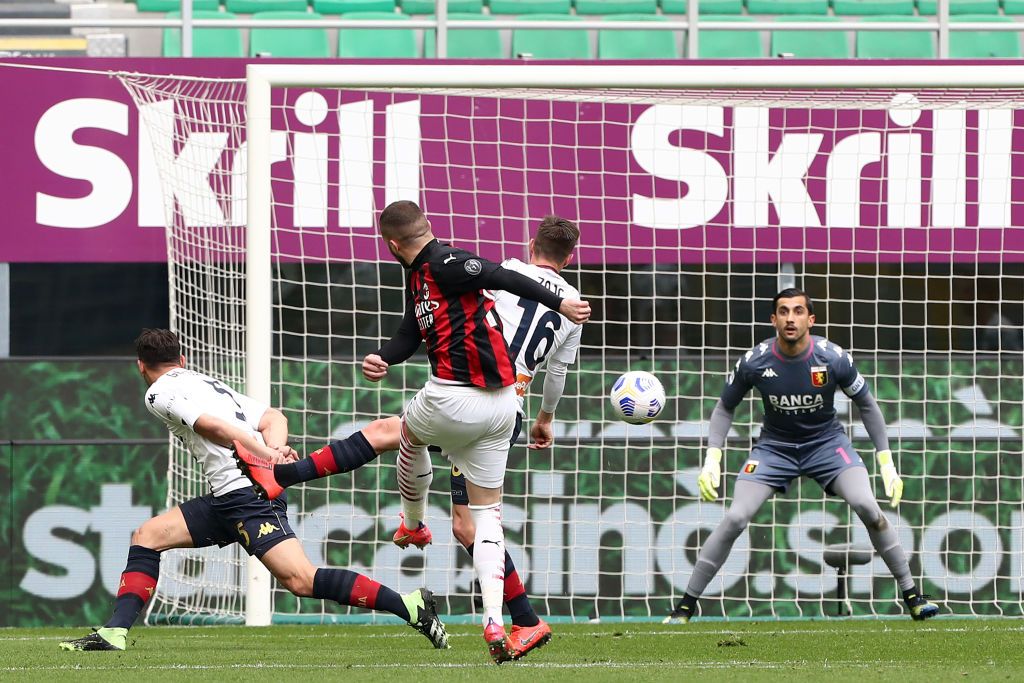 MILAN, ITALY - APRIL 18: Ante Rebic of A.C. Milan  celebrates with teammates after scoring their team's first goal  during the Serie A match between AC Milan  and Genoa CFC at Stadio Giuseppe Meazza on April 18, 2021 in Milan, Italy. Sporting stadiums around Italy remain under strict restrictions due to the Coronavirus Pandemic as Government social distancing laws prohibit fans inside venues resulting in games being played behind closed doors. (Photo by Marco Luzzani/Getty Images)