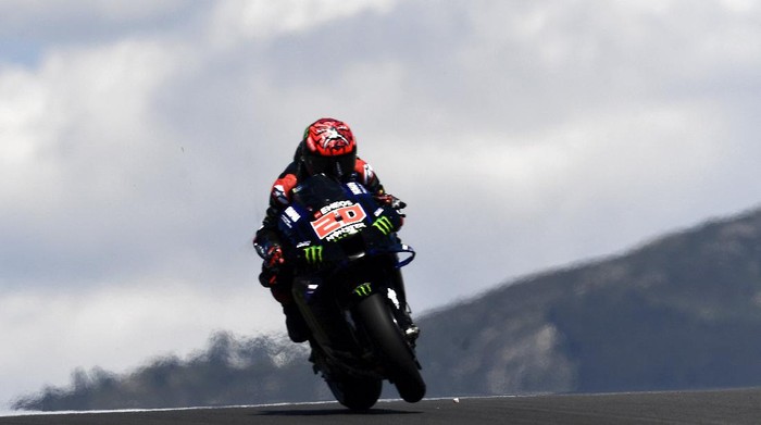 MotoGP rider Fabio Quartararo of France steers his motorcycle during the Portuguese Motorcycle Grand Prix at the Algarve International circuit near Portimao, Portugal, Sunday, April 18, 2021. (AP Photo/Jose Breton)