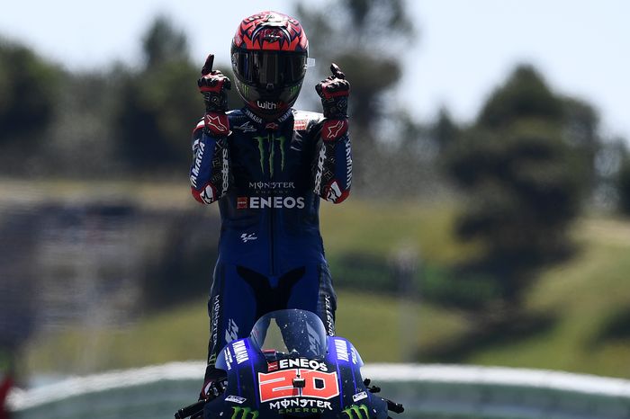 Quartararo MotoGP rider Fabio Quartararo of France celebrates after winning the Portuguese Motorcycle Grand Prix at the Algarve International circuit near Portimao, Portugal, Sunday, April 18, 2021. (AP Photo/Jose Breton)