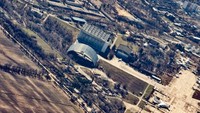 Anda akan melihat Pembangkit Listrik Tenaga Nuklir Chernobyl dan kota mati Pripyat.