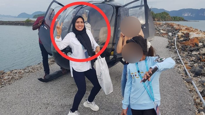 Kanit Reskrim Polsek Tapung AKP Marupa Sibarani dan Panit I Intel Aiptu Amit Elpian saat mendatangi rumah Khairuddin.