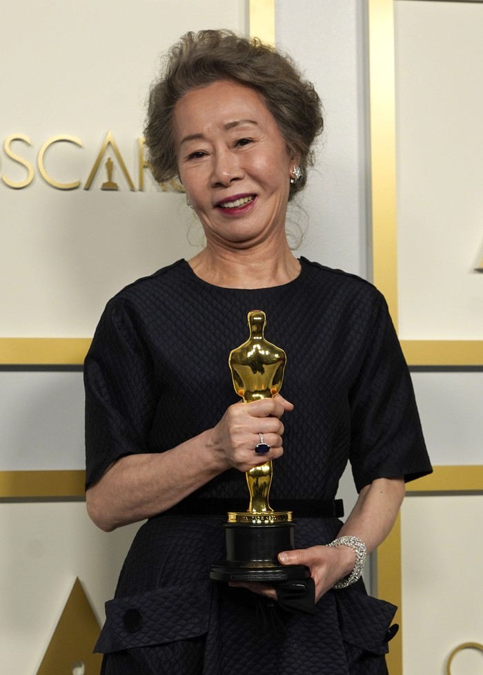 Yuh-Jung Youn, winner of the award for best actress in a supporting role for Minari, poses in the press room at the Oscars on Sunday, April 25, 2021, at Union Station in Los Angeles. (AP Photo/Chris Pizzello, Pool)