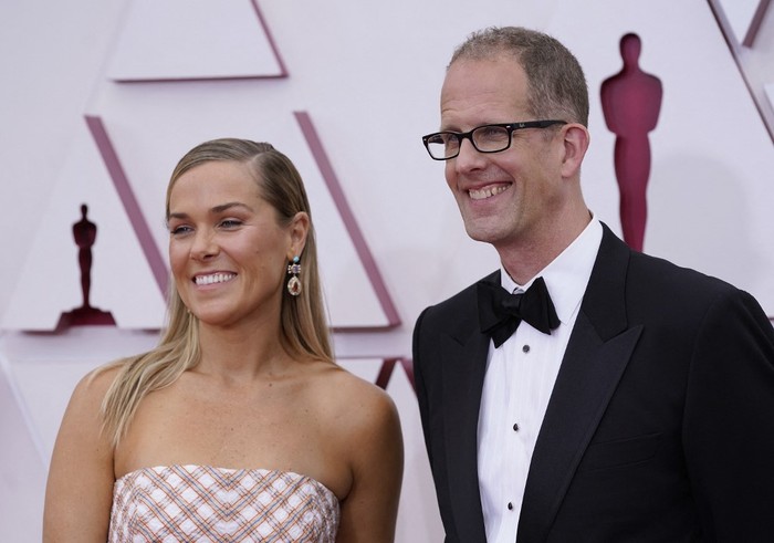US film producer Dana Leigh Murray (L) and Chief creative officer of Pixar Pete Docter arrive at the Oscars on April 25, 2021, at Union Station in Los Angeles. (Photo by Chris Pizzello / POOL / AFP)