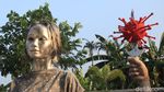 Hiii....Ada Tugu Virus Corona Ditusuk Belati di Tangerang