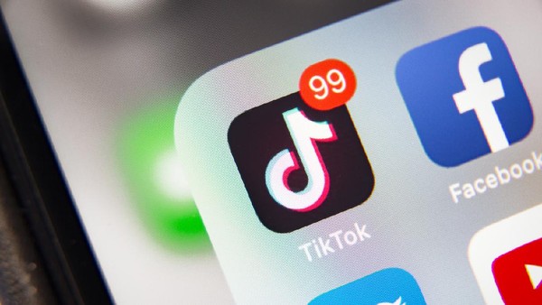 Tyumen, Russia - January 21, 2020: TikTok and Facebook application  on screen Apple iPhone XR