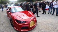 Mobil listrik ini diberi nama Quds Rise. Diluncurkan di Beirut pada khir pekan lalu, mobil yang masih berupa prototype ini tidak disebutkan dengan jelas spesifikasinya (AFP/ANWAR AMRO)