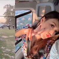 Pemilik akun TikTok @keng_pakapawan itu merekam pemandangan dari helikopter dan juga berpose duck face sebelum akhirnya menyoroti sang suami yang tengah duduk di sampingnya. Foto: Dok. TikTok @keng_pakapawan