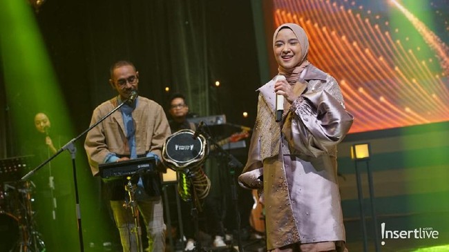 Nissa Sabyan bersama Sabyan Gambus menyanyikan sejumlah lagu populer seperti Ya Jamalu, Ahmad Ya Habibi hingga Tabassam. Foto: Dok. InsertLive