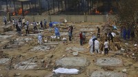 Lonjakan kasus COVID-19 ini membuat India tampak sangat menderita. Hal tersebut bisa dilihat dari banyaknya mayat yang bergelimpangan sampai-sampai layanan penguburan dan kremasi menjadi kewalahan. AP Photo/Amit Sharma.