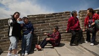 China memang bisa mengendalikan pandemi virus Corona. Sempat ada wabah baru di awal tahun 2021, namun pemerintah dengan sigap mendesak pekerja migran untuk tinggal di rumah selama Tahun Baru Imlek. (AFP/NOEL CELIS)