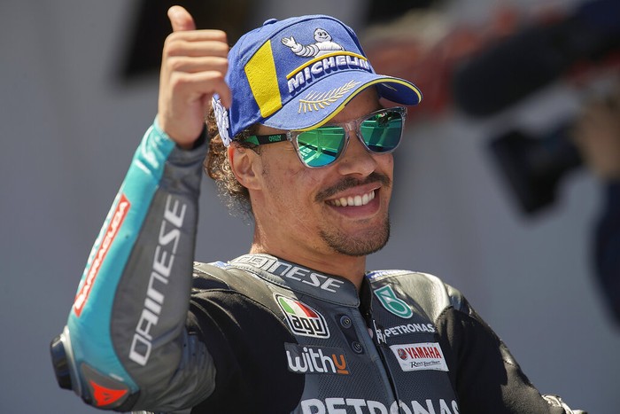 Italian rider Franco Morbidelli celebrates taking third place after the MotoGP Spanish Motorcycle Grand Prix at the Angel Nieto racetrack in Jerez de la Frontera, Spain, Sunday, May 2, 2021. (AP Photo/Jose Breton)