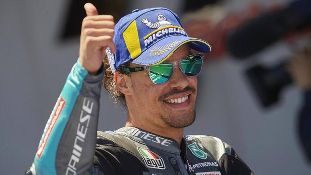 Italian rider Franco Morbidelli celebrates taking third place after the MotoGP Spanish Motorcycle Grand Prix at the Angel Nieto racetrack in Jerez de la Frontera, Spain, Sunday, May 2, 2021. (AP Photo/Jose Breton)
