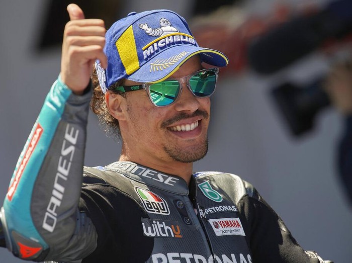Italian rider Franco Morbidelli celebrates taking third place after the MotoGP Spanish Motorcycle Grand Prix at the Angel Nieto racetrack in Jerez de la Frontera, Spain, Sunday, May 2, 2021. (AP Photo/Jose Breton)