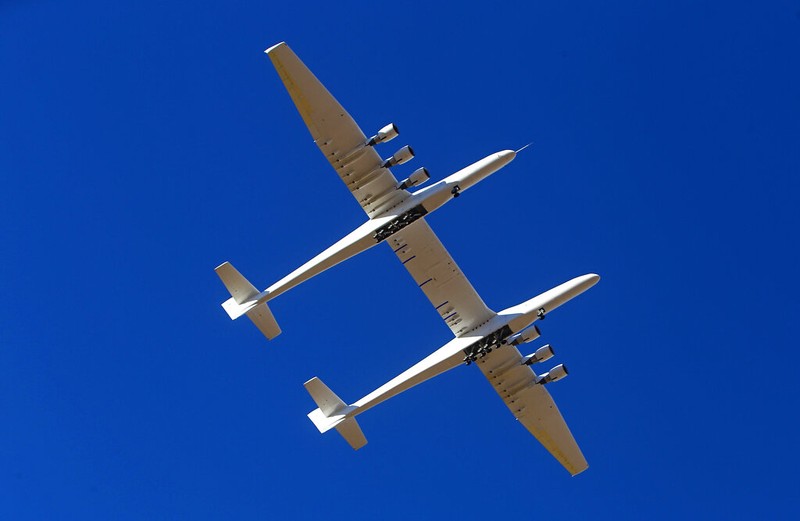 The Stratolaunch aircraft, a six-engine jet with the world's longest wingspan takes off from Mojave Air and Space Port during craft's second flight, Thursday, April 29, 2021in Mojave, Calif. The gigantic aircraft has flew for the second time in two years.  (AP Photo/Matt Hartman)