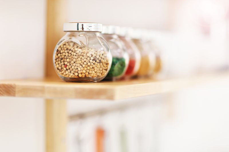 Picture showing jars with spices in the kitchen