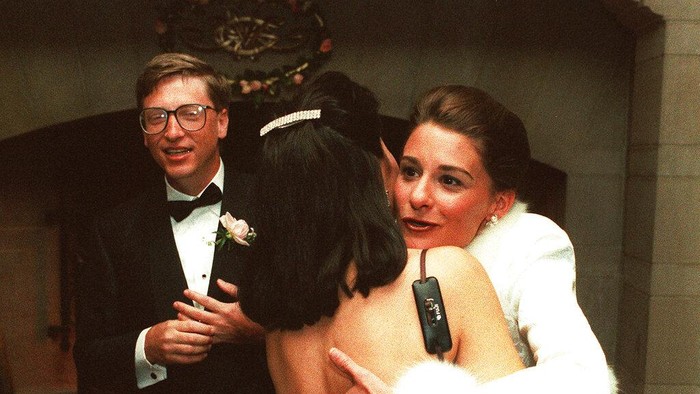 FILE - In this Jan. 9, 1994, file photo, computer mogul Bill Gates III and bride Melinda French greet guests in a reception line at a private estate in Seattle. The couple was married in Hawaii the week prior. Bill and Melinda Gates announced Monday, May 3, 2021, that they are divorcing. The Microsoft co-founder and his wife, with whom he launched the worlds largest charitable foundation, said they would continue to work together at The Bill & Melinda Gates Foundation. In identical tweets the Gates said they had made the decision to end their marriage of 27 years. (AP Photo/Dave Weaver, File)