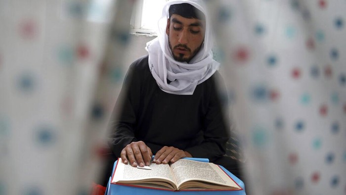 A Muslim prays in a mosque during Itikaf, which requires staying in seclusion in a mosque to read the Quran and pray during the last ten days of the Islamic fasting on month of Ramadan, in Kabul, Afghanistan, Tuesday, May 4, 2021. (AP Photo/Rahmat Gul)